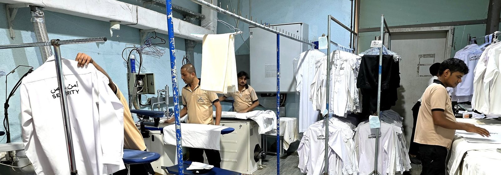 Staff uniform finishing and hand pressing